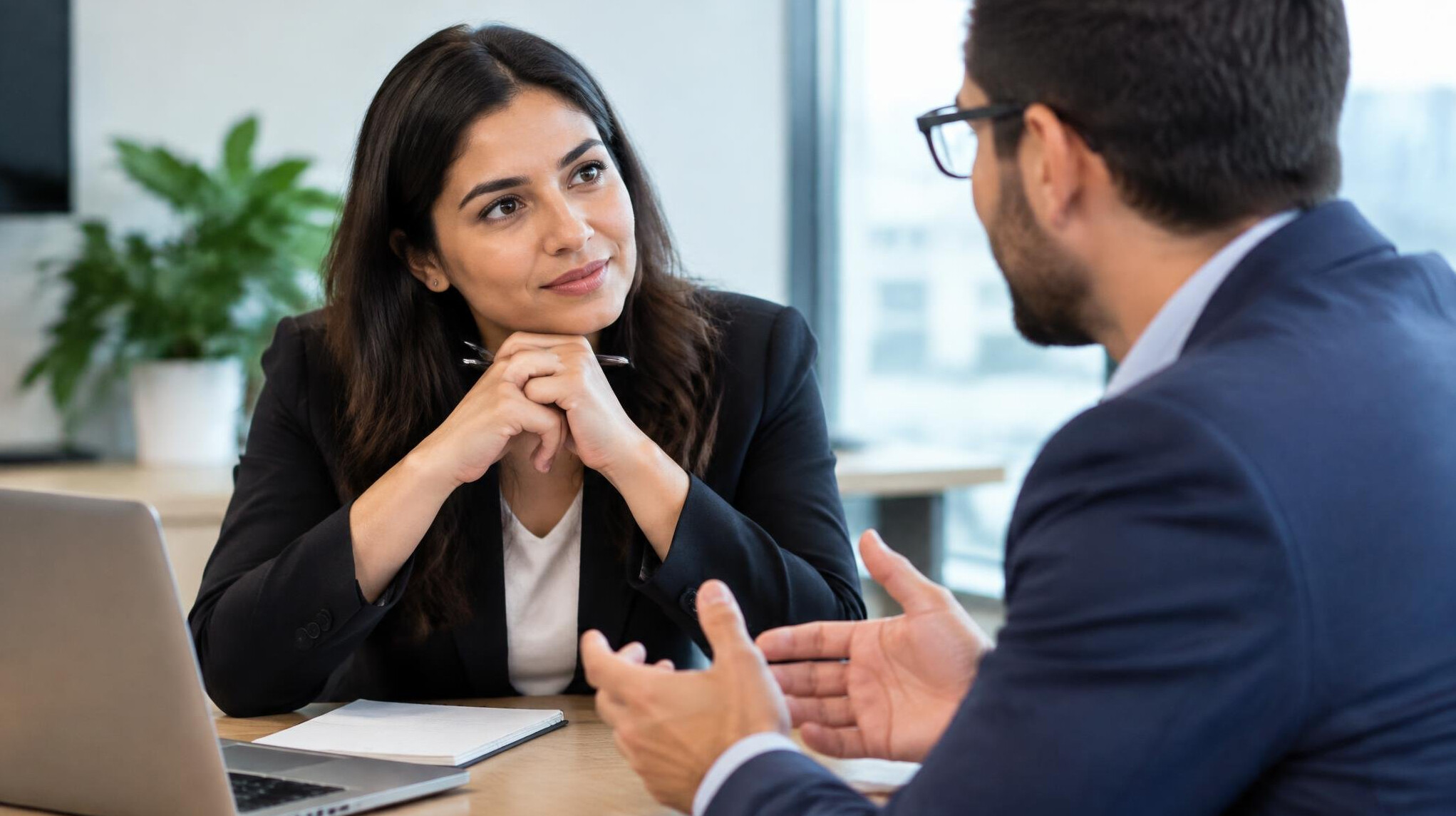 person listening attentively in meeting